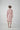 Comfortable pink Turkish cotton bathrobe with a waffle texture, ideal for lounging, featured on ReplenishGoods.com.