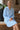 Baby blue Turkish cotton muslin robe worn in a day spa