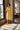 Electric yellow muslin cotton robe in a sunlit Brooklyn loft with exposed brick