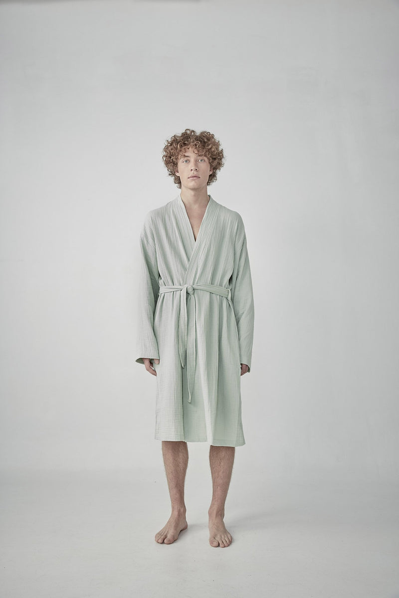 Comfortable soft lightweight matcha green Turkish cotton bathrobe with a waffle texture, ideal for lounging,travelling featured on ReplenishGoods.com.