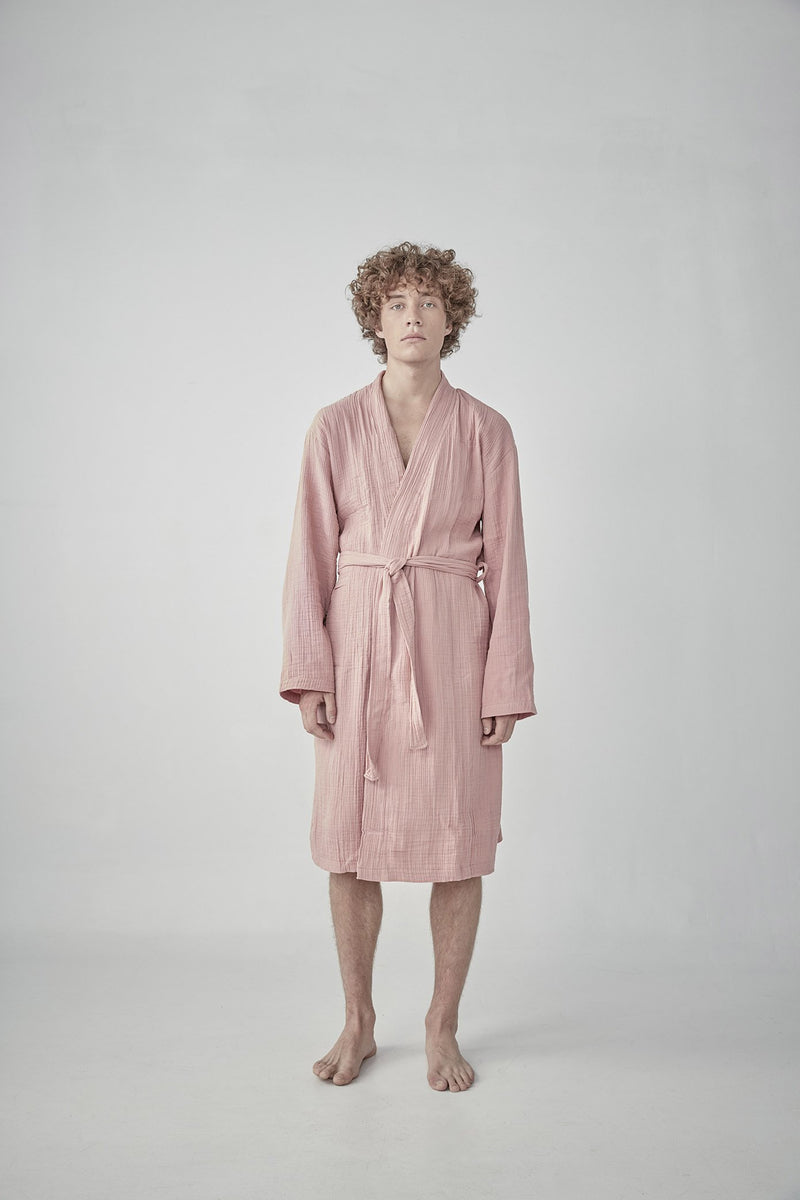 Comfortable pink Turkish cotton bathrobe with a waffle texture, ideal for lounging, featured on ReplenishGoods.com.