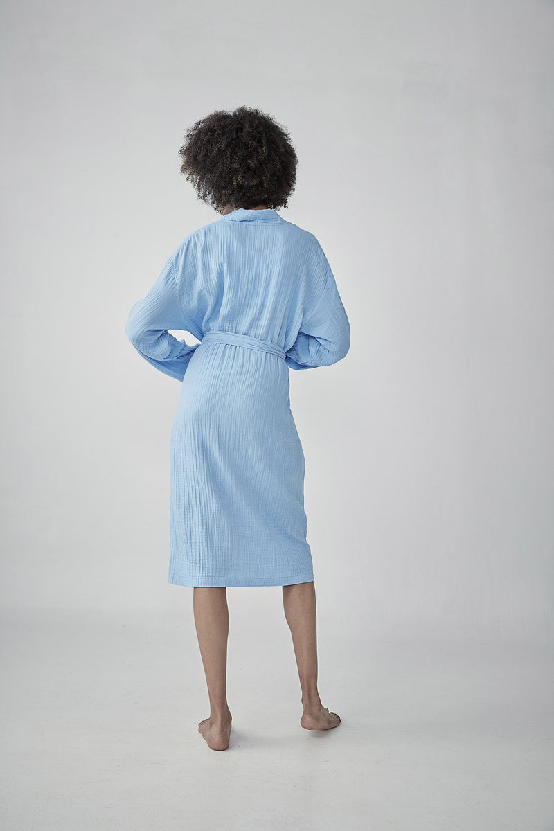 Comfortable sky-blue Turkish cotton bathrobe with a waffle texture, ideal for lounging, featured on ReplenishGoods.com.