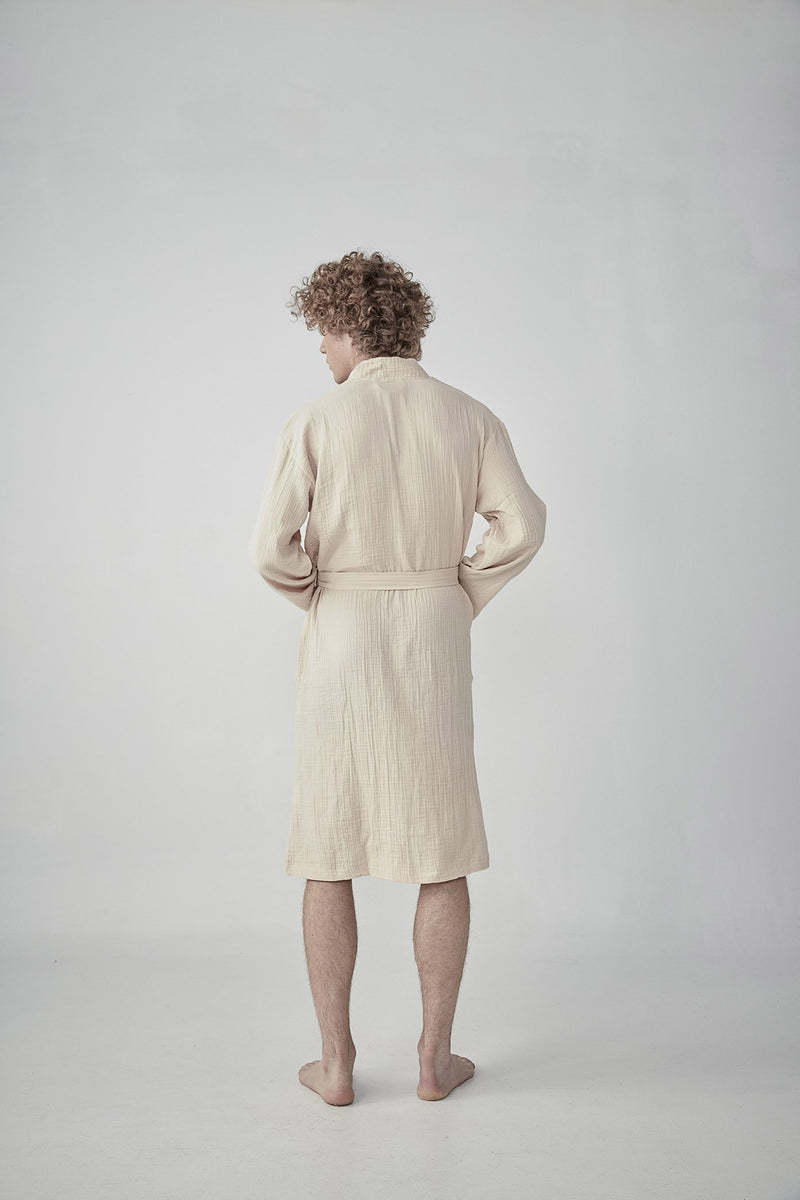 Comfortable soft light, beige-brown Turkish cotton bathrobe with a waffle texture, ideal for lounging,travelling featured on ReplenishGoods.com.