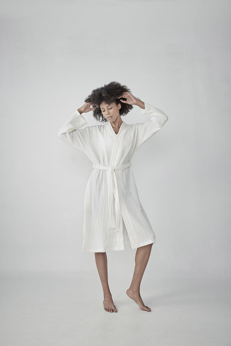 Comfortable cloud white Turkish cotton bathrobe with a waffle texture, ideal for lounging, featured on ReplenishGoods.com.