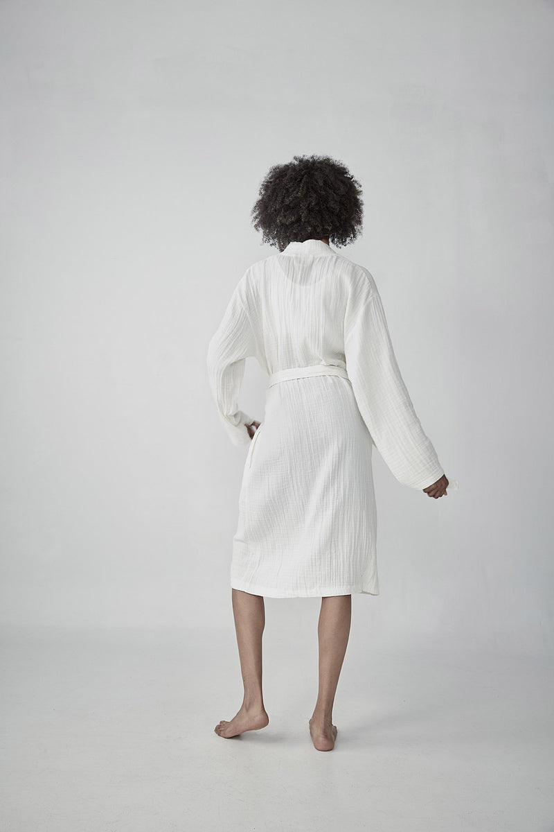 Comfortable cloud white Turkish cotton bathrobe with a waffle texture, ideal for lounging, featured on ReplenishGoods.com.