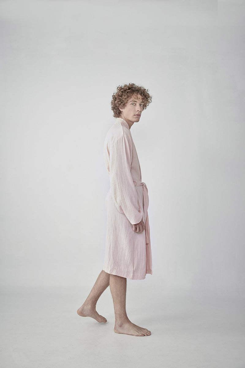 hoverComfortable dust pink Turkish cotton bathrobe with a waffle texture, ideal for lounging, featured on ReplenishGoods.com.